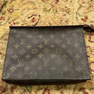 Authentic Louis Vuitton toiletry pouch/cosmetic bag